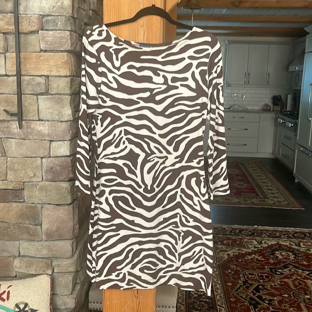 Melly M, dress size XS. Brown and beige animal print.